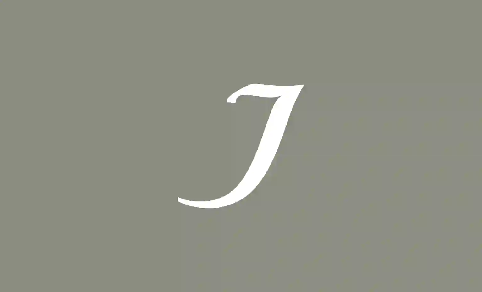 J logo on a grey background